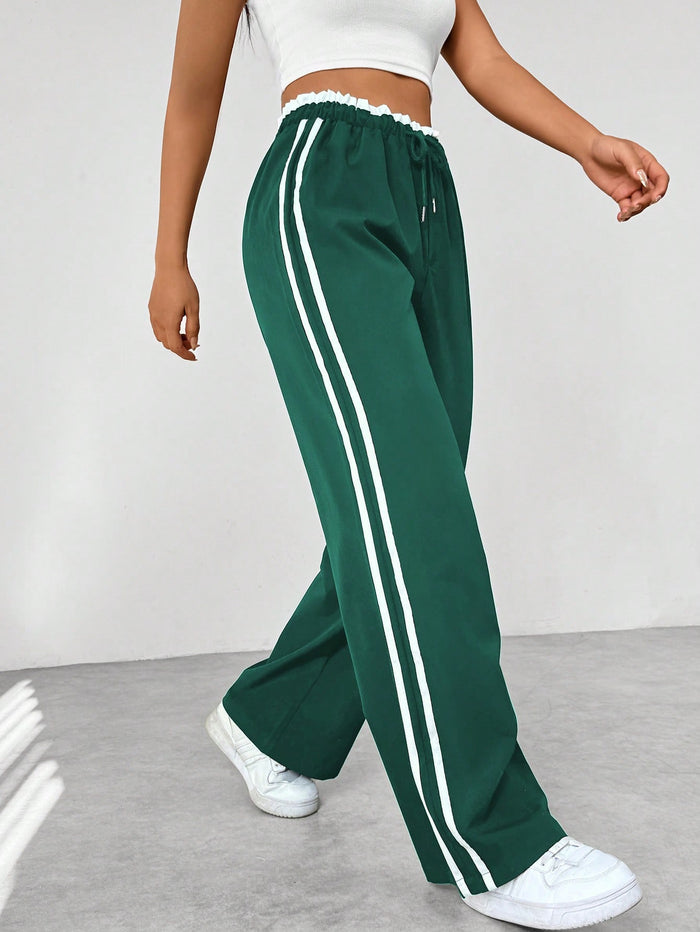 MiraFit | Sportliche Jogginghose mit Seitenstreifen für Damen