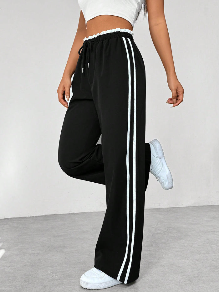 MiraFit | Sportliche Jogginghose mit Seitenstreifen für Damen