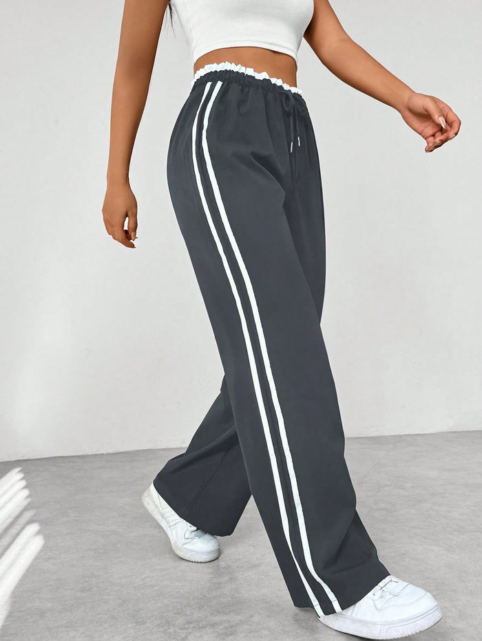 MiraFit | Sportliche Jogginghose mit Seitenstreifen für Damen