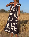 Serena | Kleid mit V-Ausschnitt und modernem Print