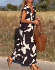 Serena | Kleid mit V-Ausschnitt und modernem Print