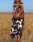 Serena | Kleid mit V-Ausschnitt und modernem Print